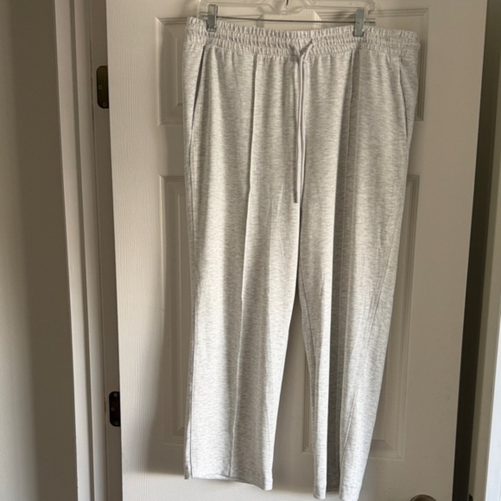 Danskin women's drawstring jogger sweatpants in light heather grey.